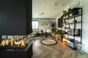 Modern living room interior featuring a glass fireplace and black shelving.