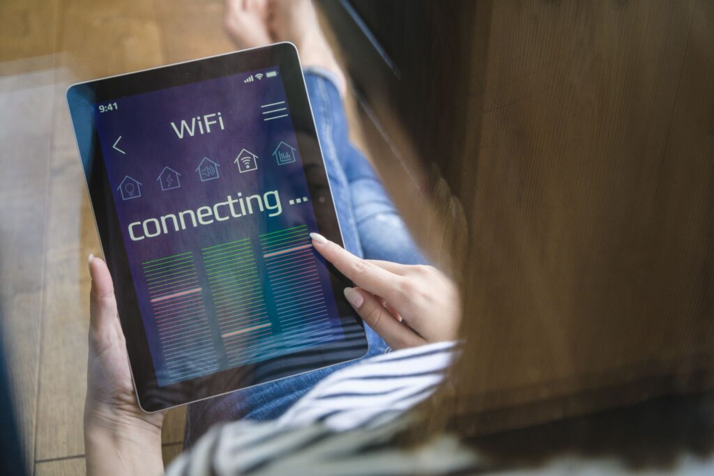 small-checks-today-can-prevent-bigger-problems-later a girl's tablet is showing its connecting to wifi
