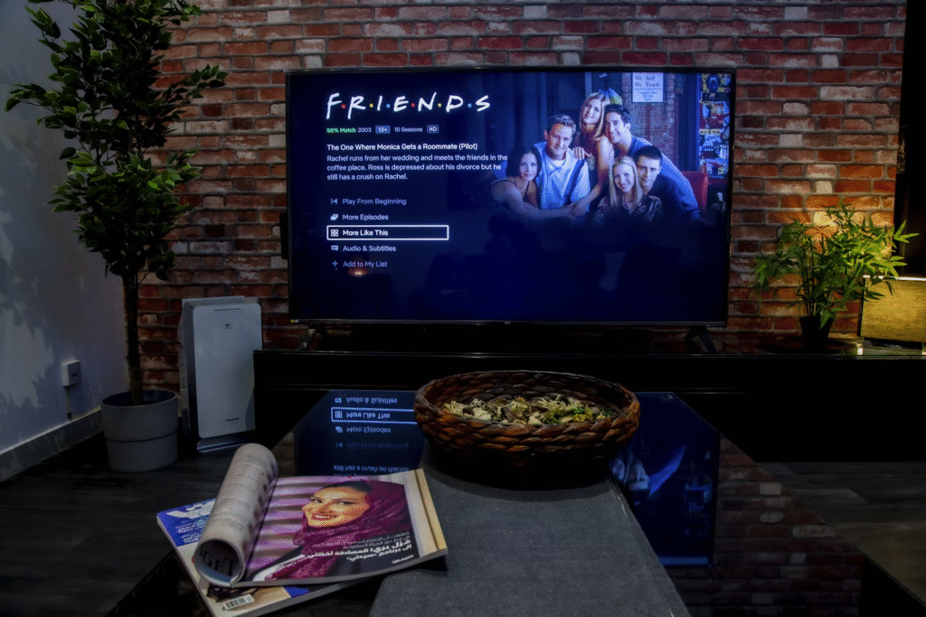 a netflix show "friends" displayed in the tv in the living room
