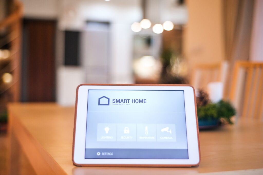 an ipad with the interface of a smart home