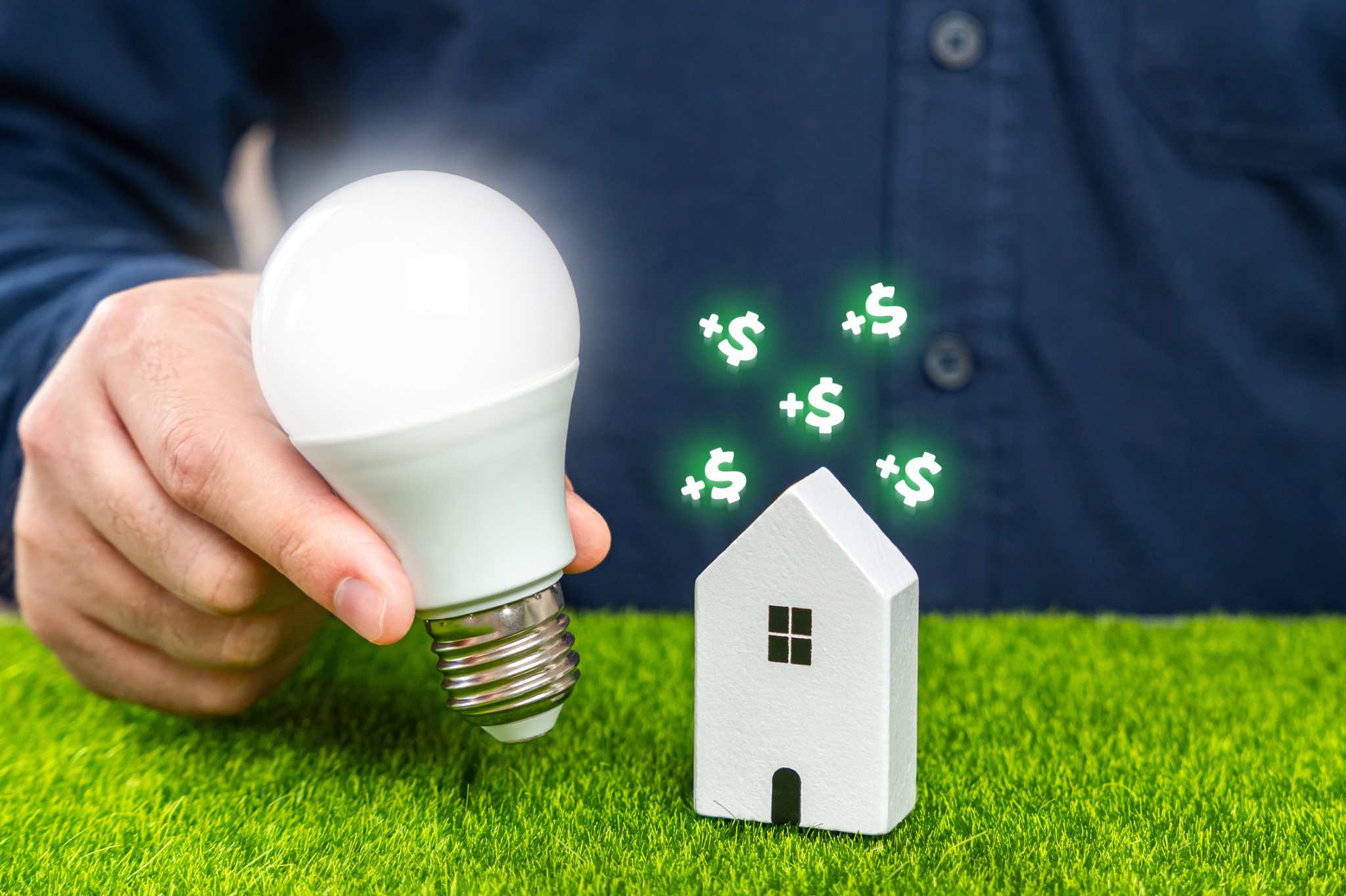 a man holding a lightbulb