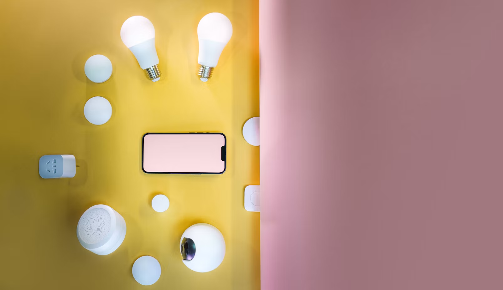 a yellow and pink backgroud with smart lighting devices